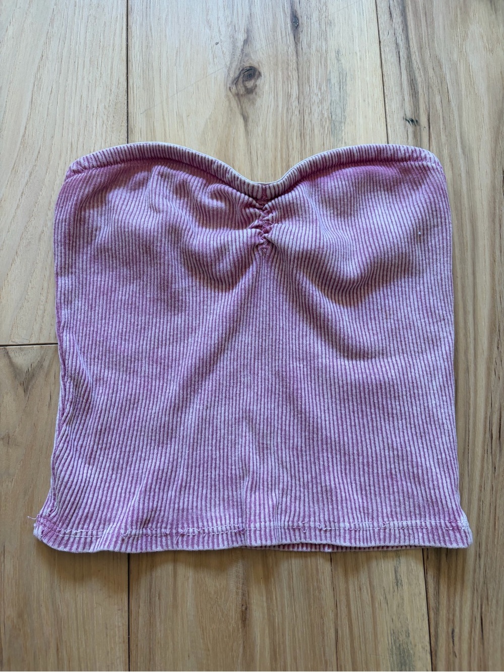 Ribbed tube top has sticky part on top to stay up
